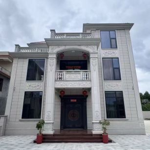 那曲 芝麻白石材别墅干挂案例展示